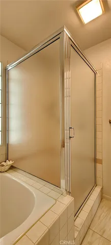 a kitchen with a sink cabinets and window