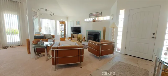 a view of a swimming pool and kitchen