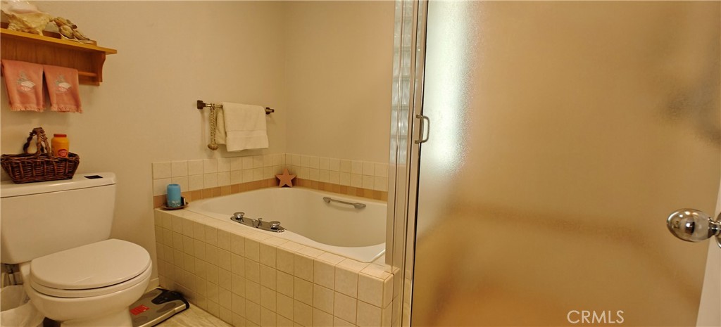 6144 Carodean Road Twentynine Palms, CA 92277 - Photo 66 of 71 a bathroom with a sink and a toilet