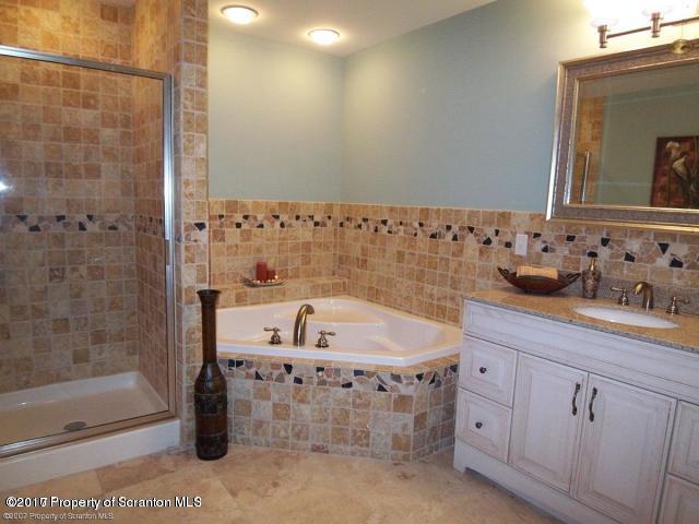 705 Green Ridge Street Scranton, PA 18509 - Photo 11 of 14 a bathroom with a sink and a mirror