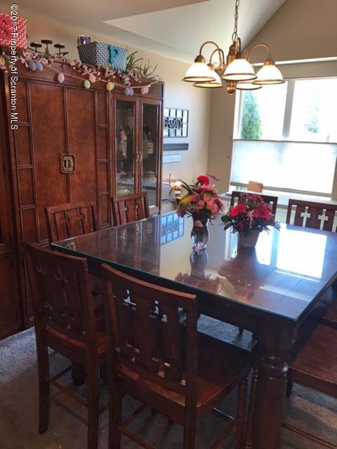 705 Green Ridge Street Scranton, PA 18509 - Photo 2 of 14 a view of a dining room with furniture and chandelier