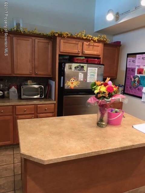 705 Green Ridge Street Scranton, PA 18509 - Photo 3 of 14 a kitchen with stainless steel appliances a sink and a microwave