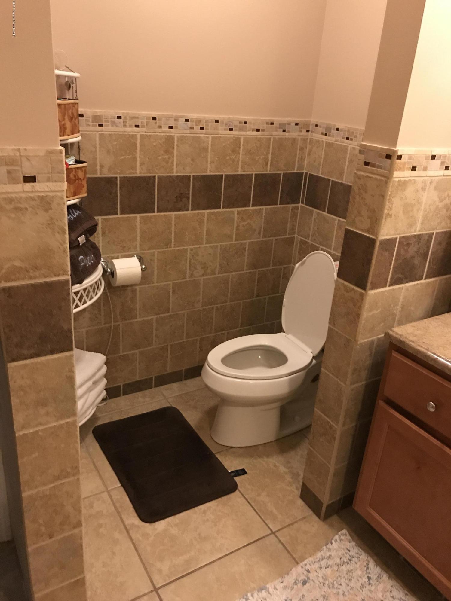 705 Green Ridge Street Scranton, PA 18509 - Photo 6 of 14 a bathroom with a toilet and a shower