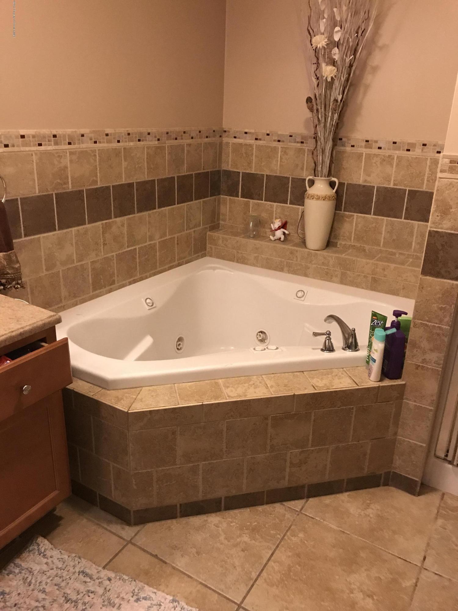 705 Green Ridge Street Scranton, PA 18509 - Photo 8 of 14 a view of a bathtub in a bathroom