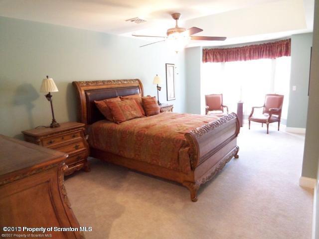 705 Green Ridge Street Scranton, PA 18509 - Photo 10 of 14 a bed room with a bed window and a table