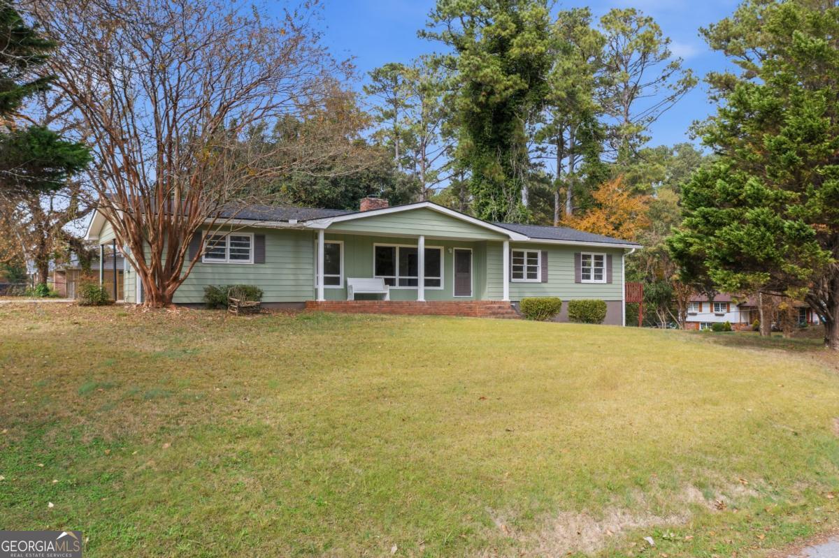 14 Mitchell Circle Rome, GA 30161 - Photo 1 of 39 a front view of a house with yard and green space