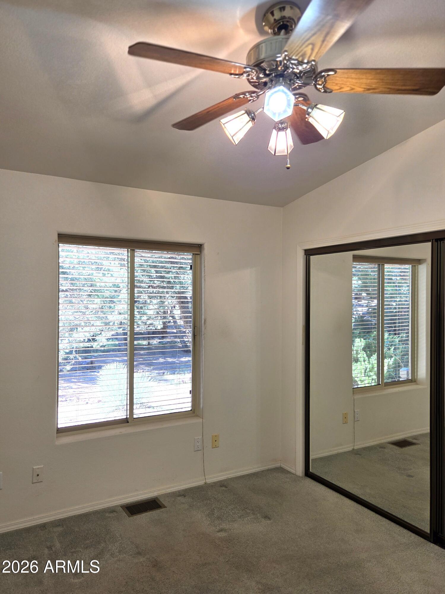 3638 North Whispering Pine Road Pine, AZ 85544 - Photo 21 of 32 Guest Bedroom with Mirrored Closet Doors