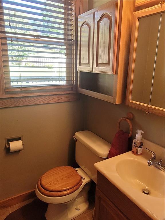 117 Thompson Road Sarver, PA 16055 - Photo 14 of 25 a bathroom with a toilet sink and mirror