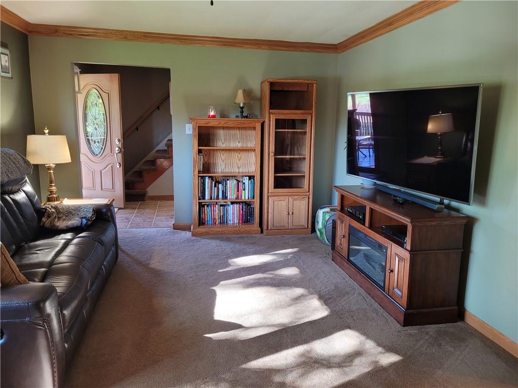 117 Thompson Road Sarver, PA 16055 - Photo 17 of 25 a living room with furniture and a flat screen tv