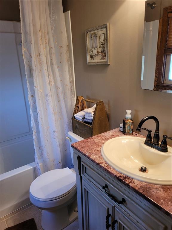 117 Thompson Road Sarver, PA 16055 - Photo 21 of 25 a bathroom with a granite countertop toilet sink and mirror