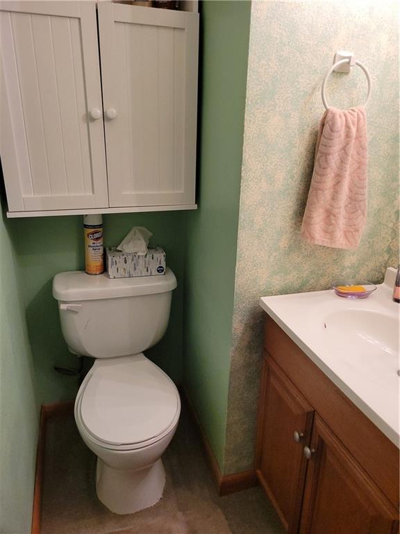 117 Thompson Road Sarver, PA 16055 - Photo 24 of 25 a bathroom with a sink mirror and toilet