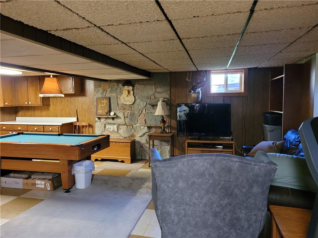117 Thompson Road Sarver, PA 16055 - Photo 25 of 25 a living room with furniture pool table table and a flat screen tv