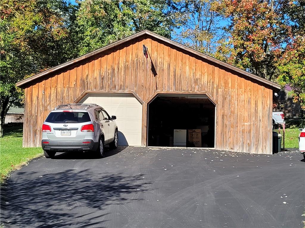 117 Thompson Road Sarver, PA 16055 - Photo 4 of 25 a view of car parked in front of a house
