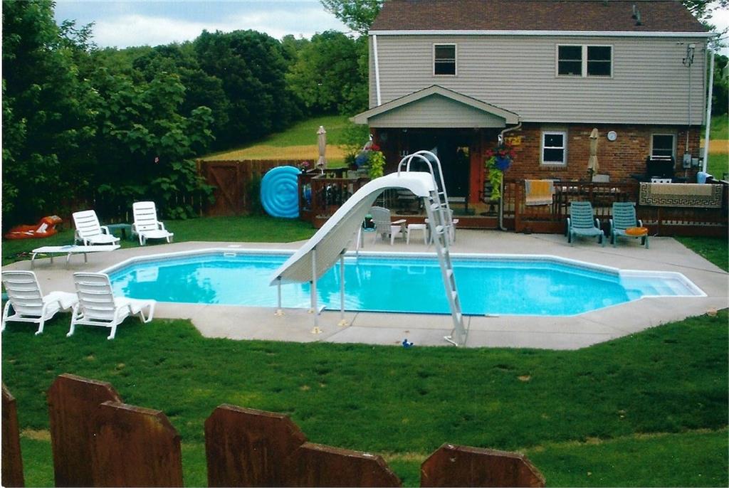 117 Thompson Road Sarver, PA 16055 - Photo 7 of 25 a view of a house with backyard and a slide