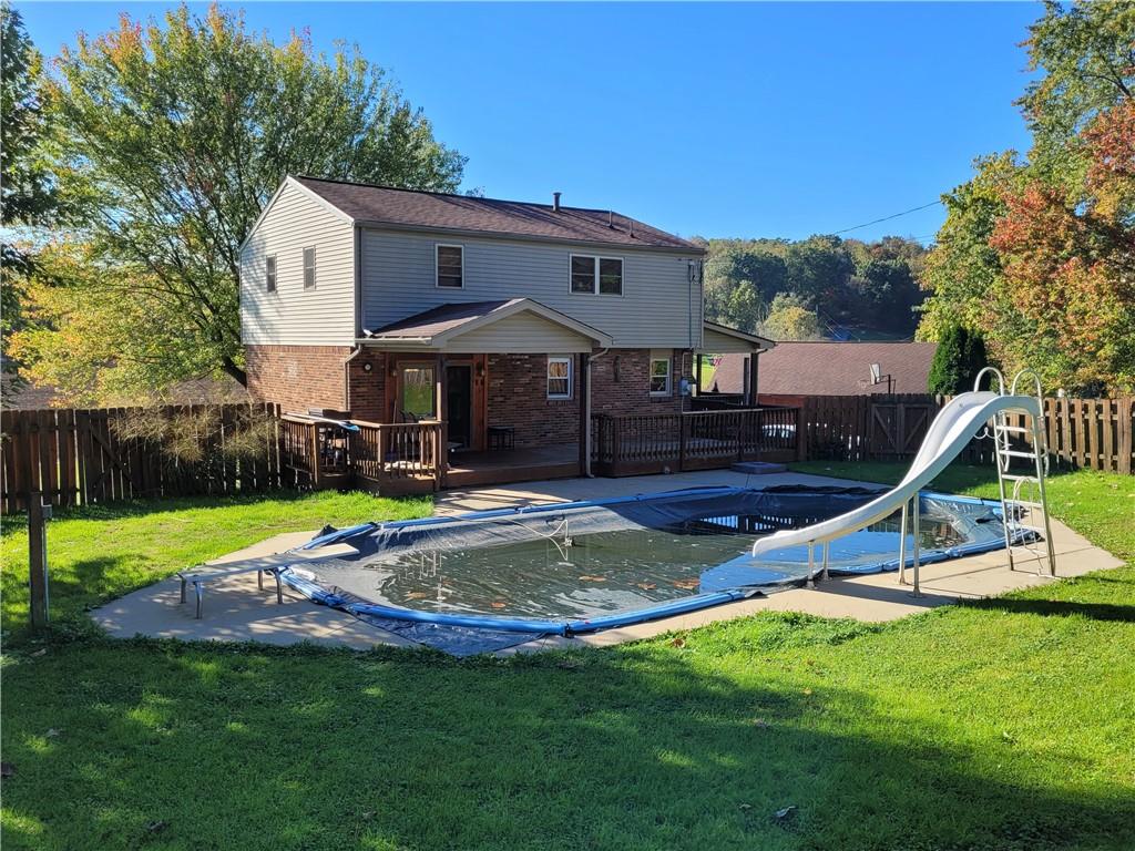 117 Thompson Road Sarver, PA 16055 - Photo 10 of 25 a view of a house with a swimming pool and sitting area
