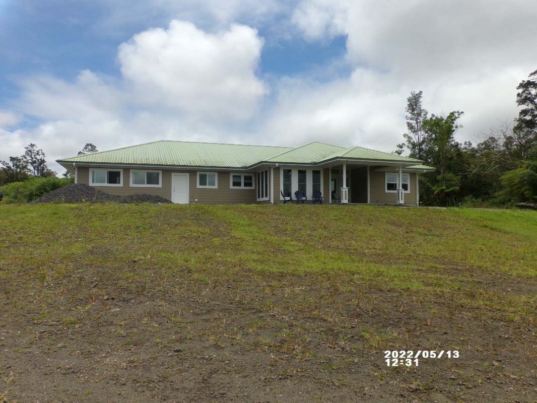 18-4177 North Peck Road Mountain View, HI 96771 - Photo 1 of 24 a view of a house with a yard