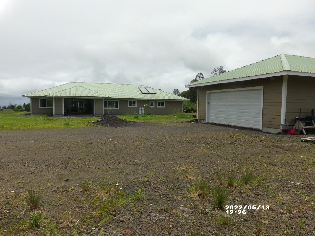 18-4177 North Peck Road Mountain View, HI 96771 - Photo 19 of 24 a view of a house with a yard