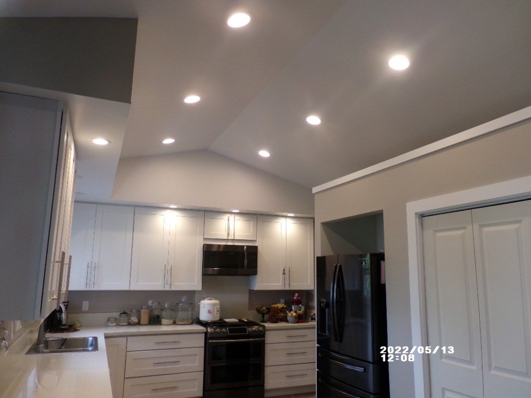 18-4177 North Peck Road Mountain View, HI 96771 - Photo 6 of 24 a kitchen with stainless steel appliances a refrigerator and a stove top oven