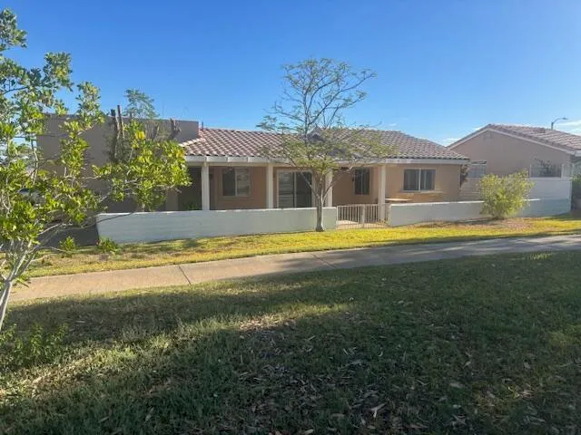 a view of a house with a swimming pool