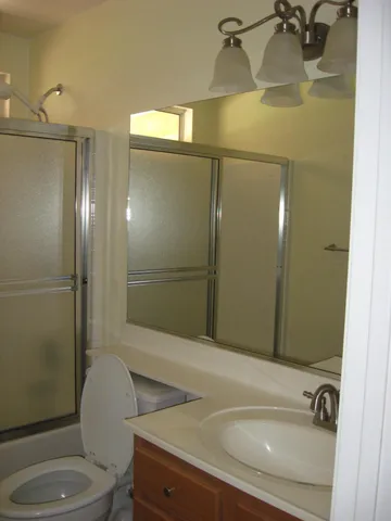 a bathroom with a sink and mirror