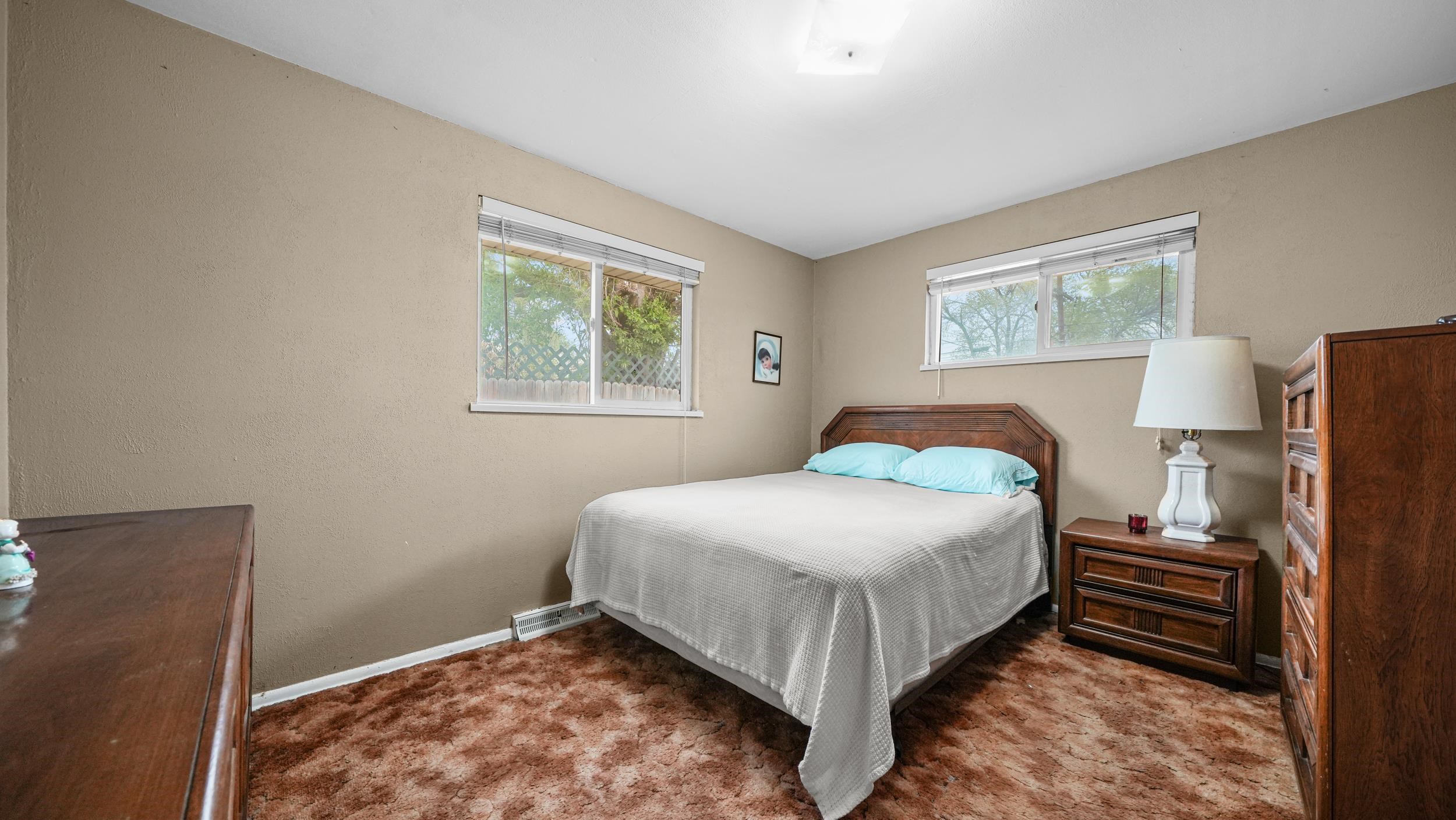 404 North 25th Street Grand Junction, CO 81501 - Photo 12 of 21 a bedroom with a bed and a window
