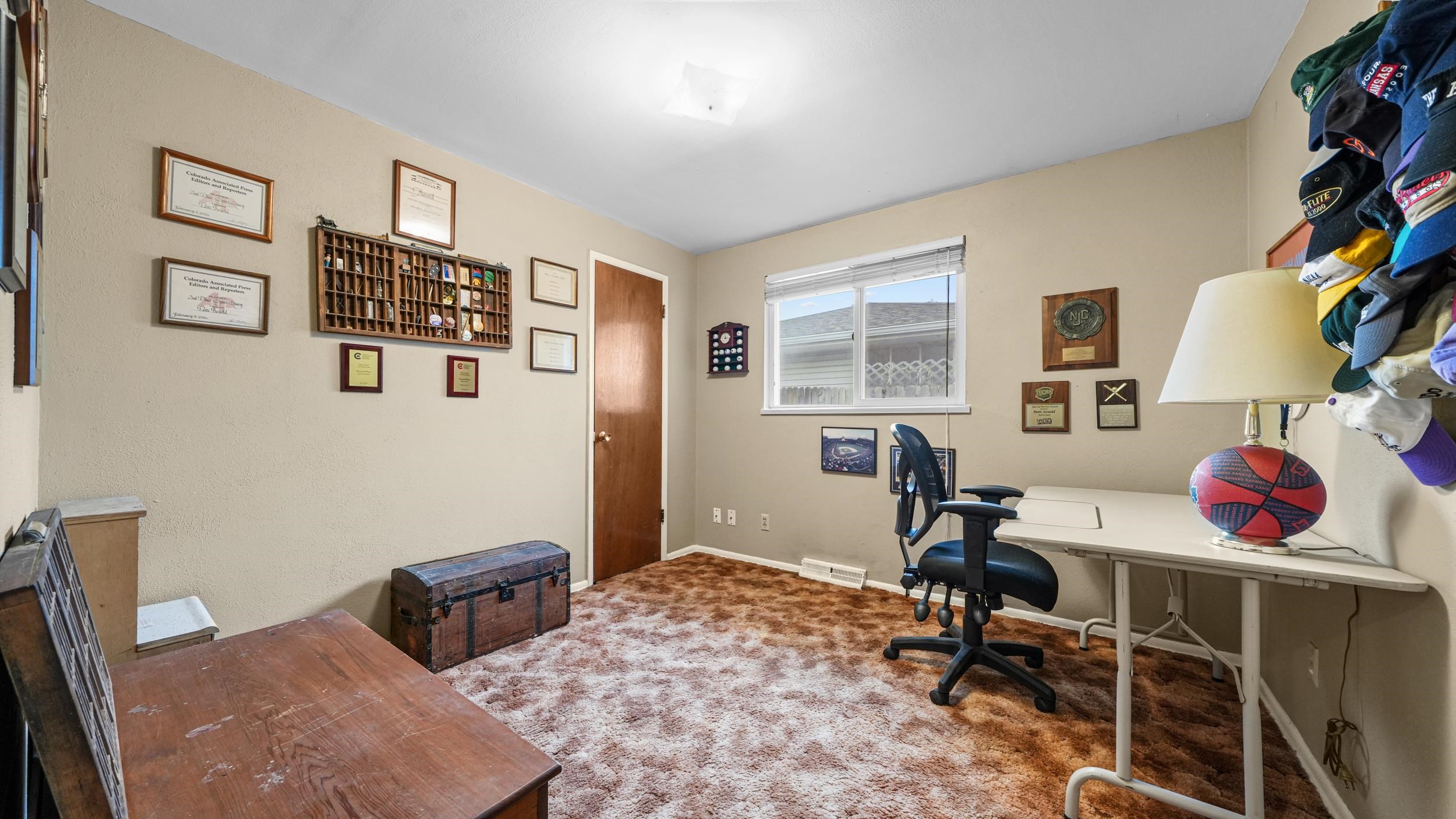 404 North 25th Street Grand Junction, CO 81501 - Photo 16 of 21 a living room with furniture and a window