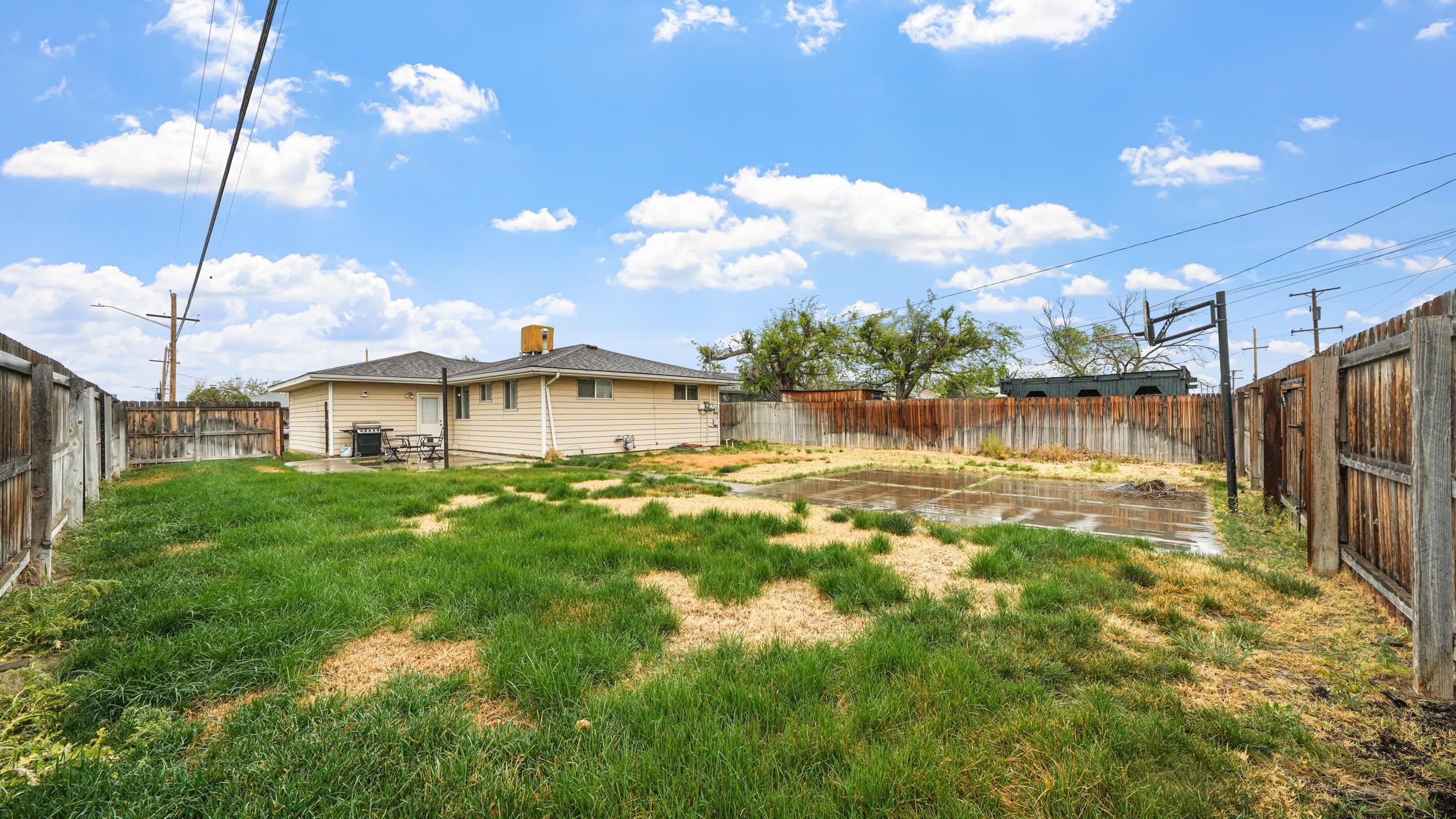 404 North 25th Street Grand Junction, CO 81501 - Photo 17 of 21 a view of a house with a big yard