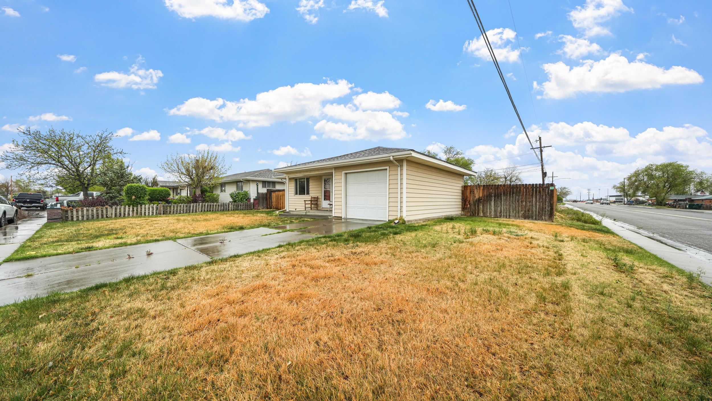 404 North 25th Street Grand Junction, CO 81501 - Photo 3 of 21 a view of a house with swimming pool