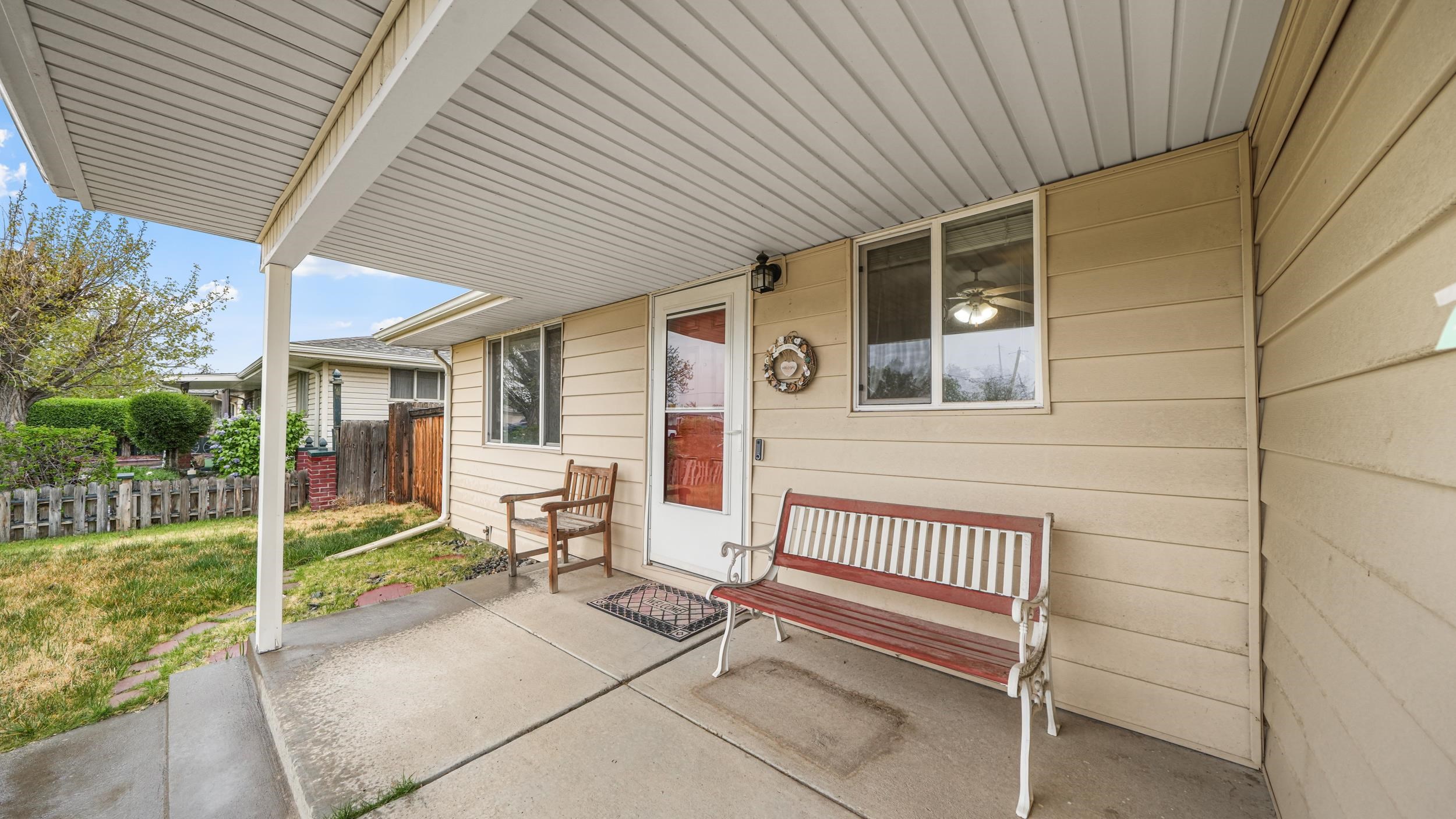 404 North 25th Street Grand Junction, CO 81501 - Photo 4 of 21 a backyard of a house with garden and outdoor seating