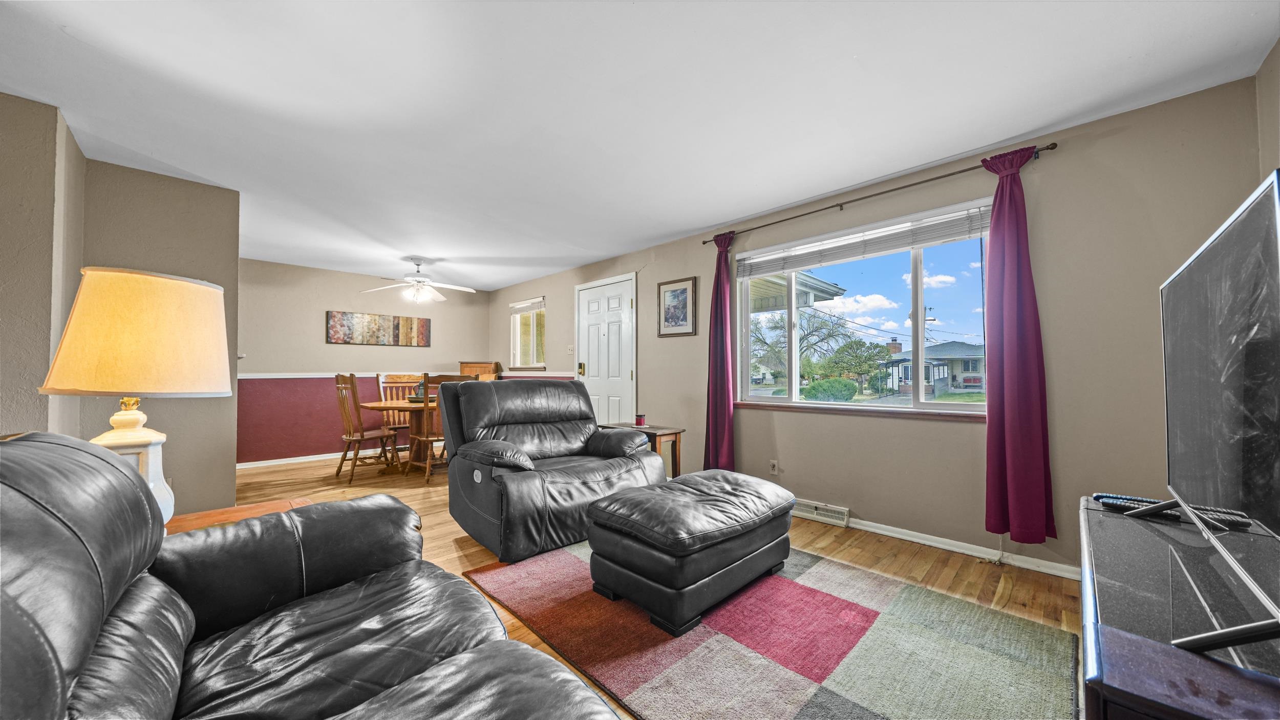 404 North 25th Street Grand Junction, CO 81501 - Photo 7 of 21 a living room with furniture and a window