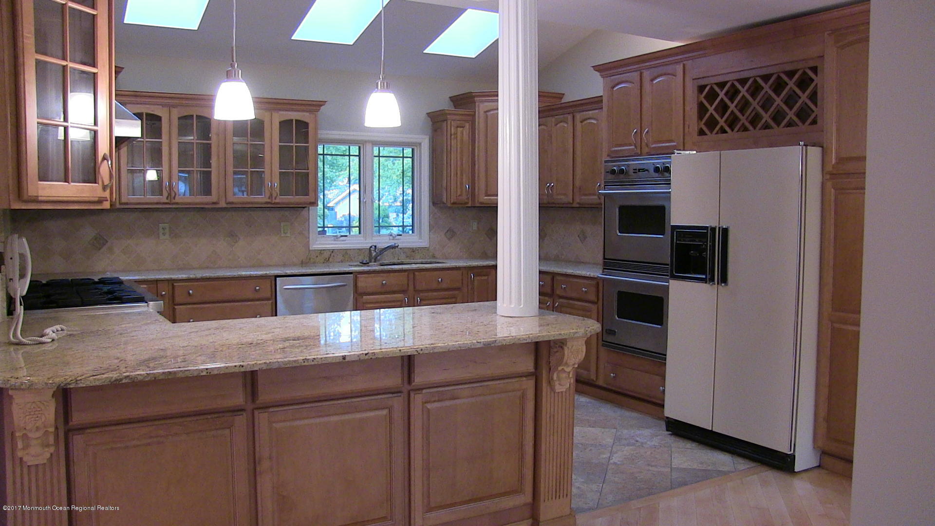 11 Crabtree Road Matawan, NJ 07747 - Photo 8 of 34 a kitchen with stainless steel appliances granite countertop a refrigerator and a sink