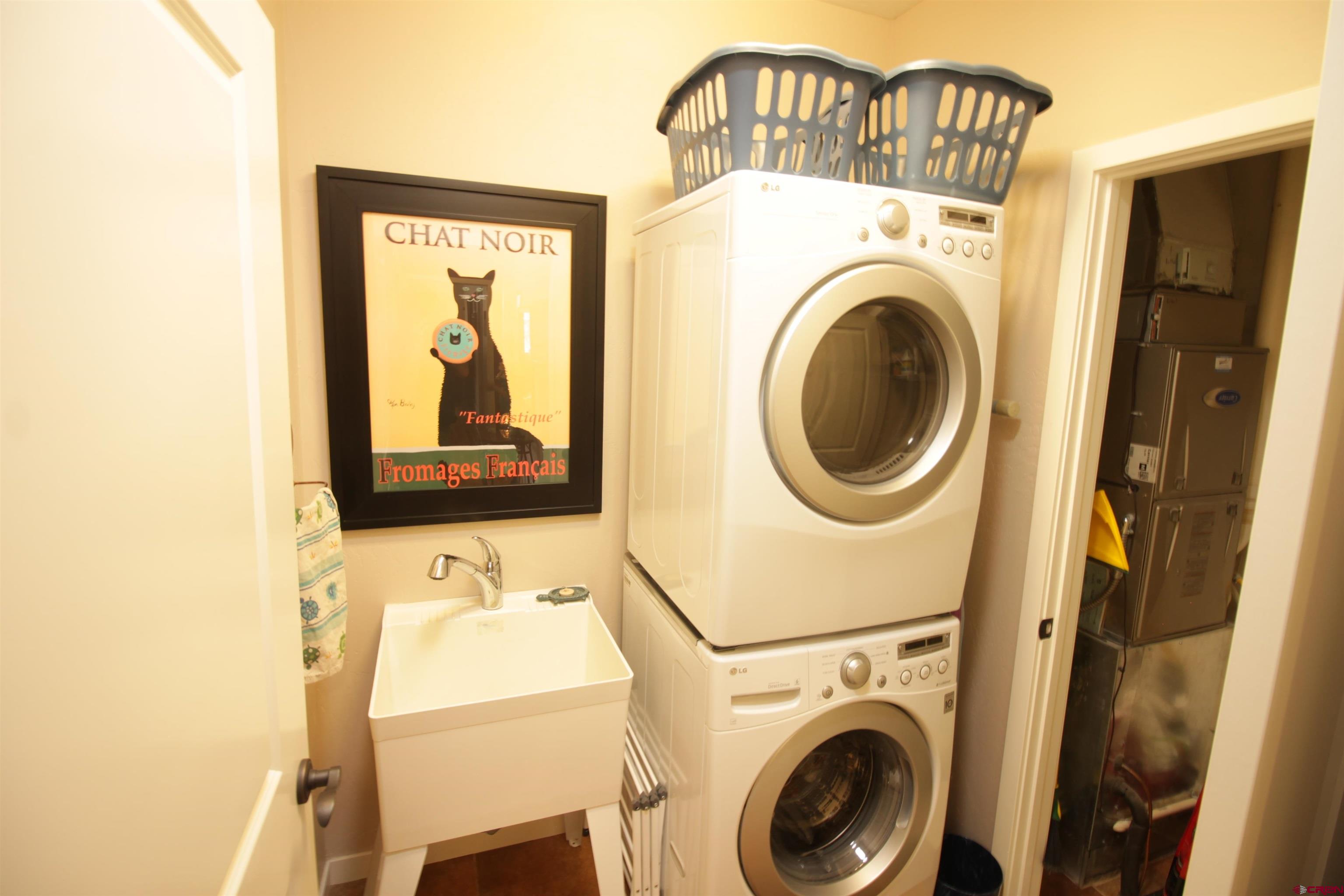 480 Oxbow Circle Durango, CO 81301 - Photo 14 of 16 a utility room with dryer and washer