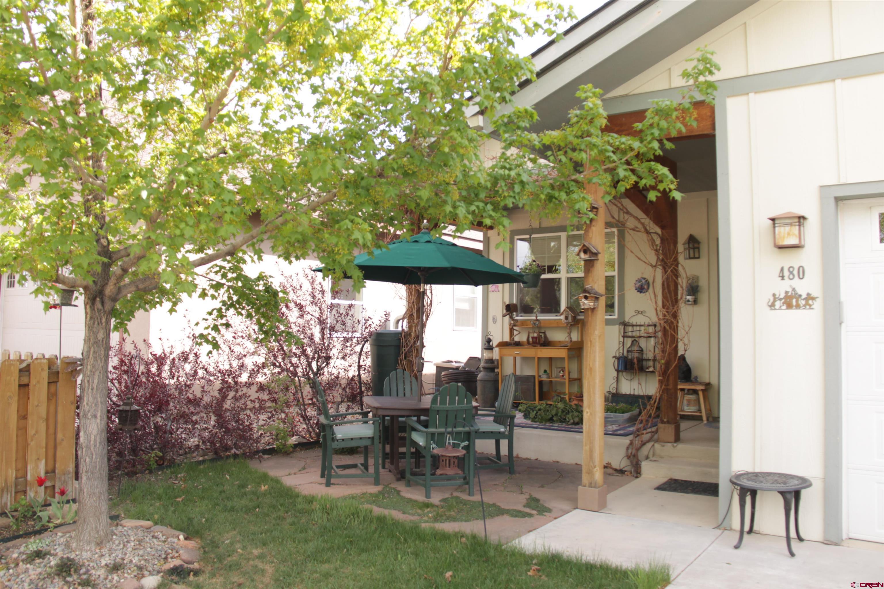 480 Oxbow Circle Durango, CO 81301 - Photo 15 of 16 a view of a patio with table and chairs and potted plants