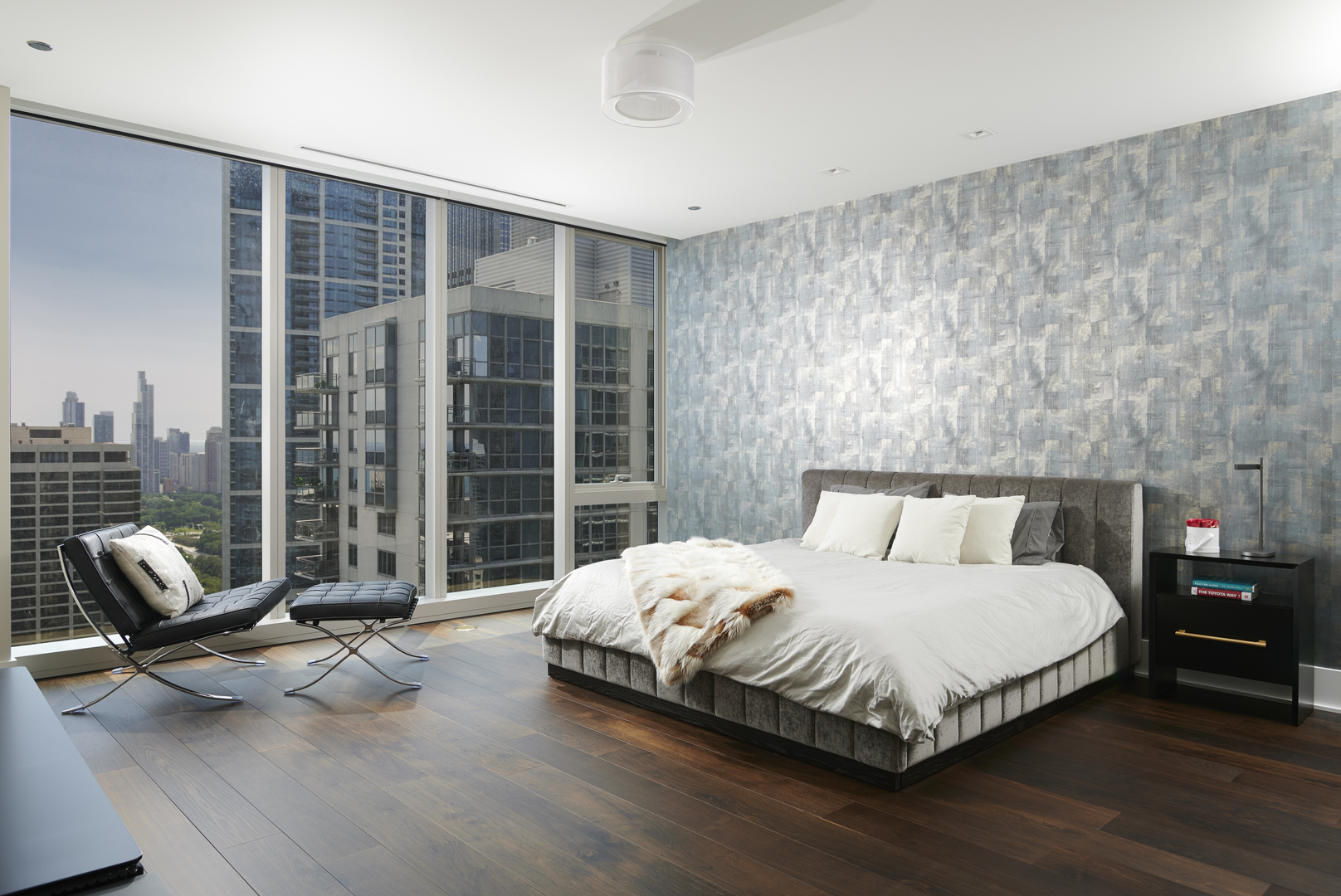 363 East Wacker Drive, Unit 3303 Chicago, IL 60601 - Photo 11 of 31 a bedroom with a bed chair and a large window