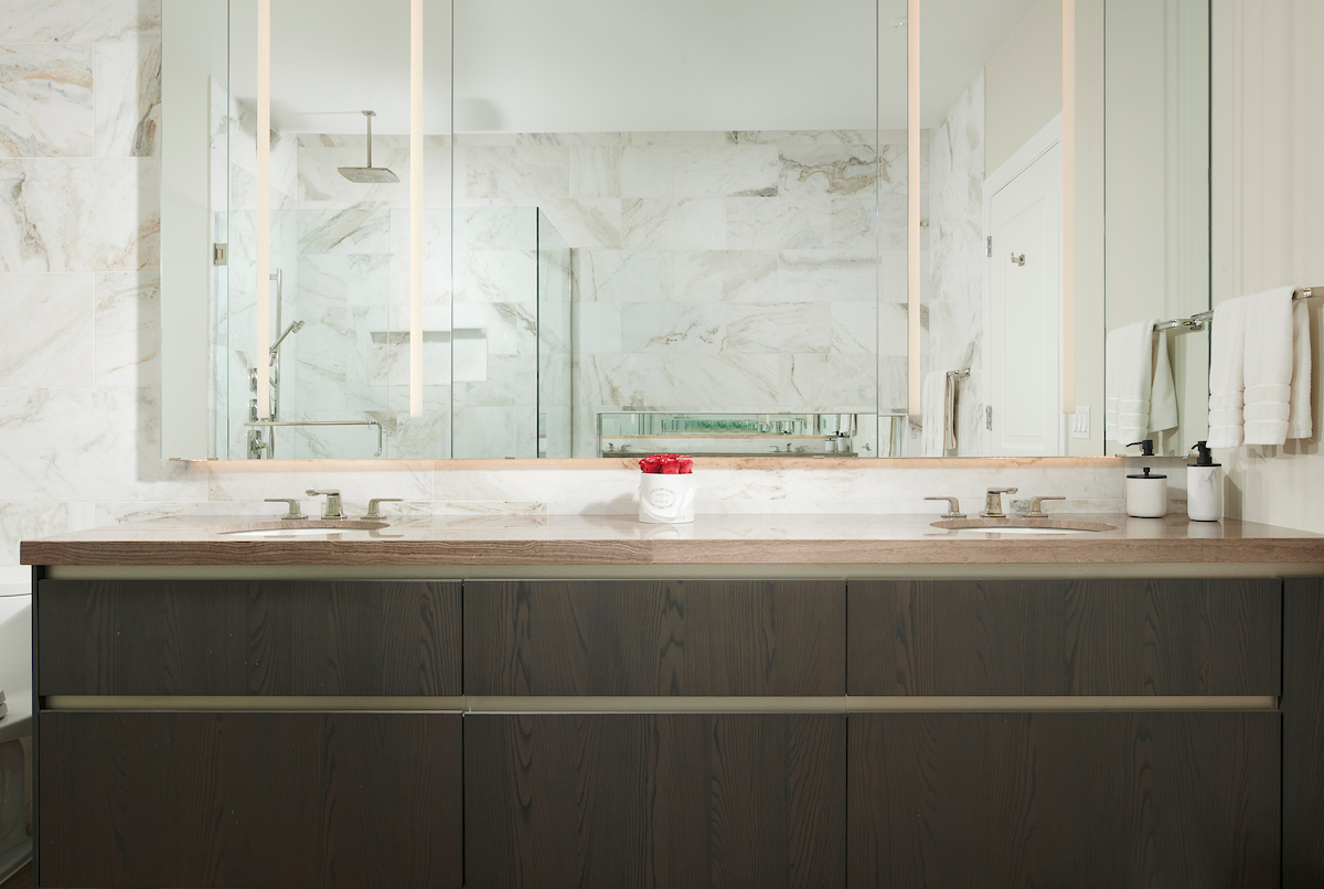 363 East Wacker Drive, Unit 3303 Chicago, IL 60601 - Photo 15 of 31 a bathroom with a sink and a mirror