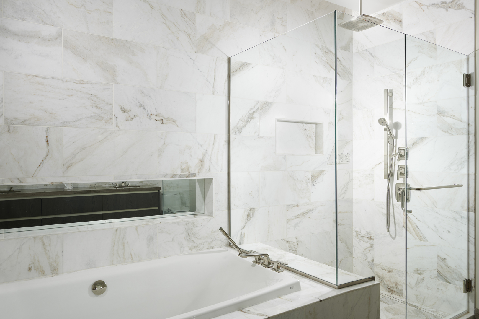 363 East Wacker Drive, Unit 3303 Chicago, IL 60601 - Photo 16 of 31 a bathroom with a bathtub and a shower