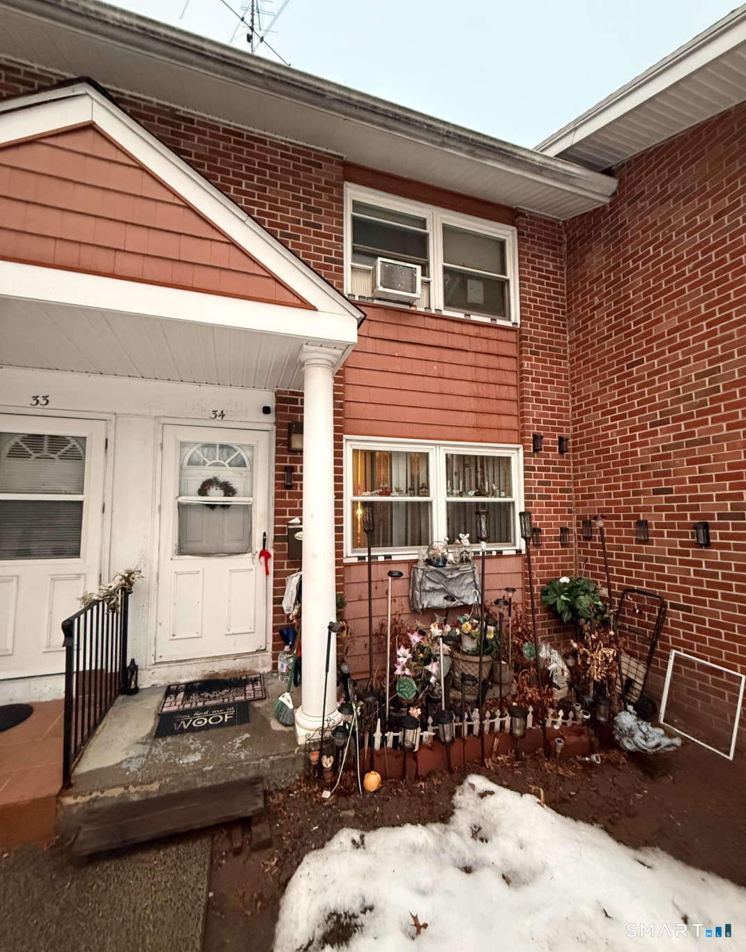 280 Capen Street Hartford, CT 06112 - Photo 3 of 11 a front view of a house with large windows