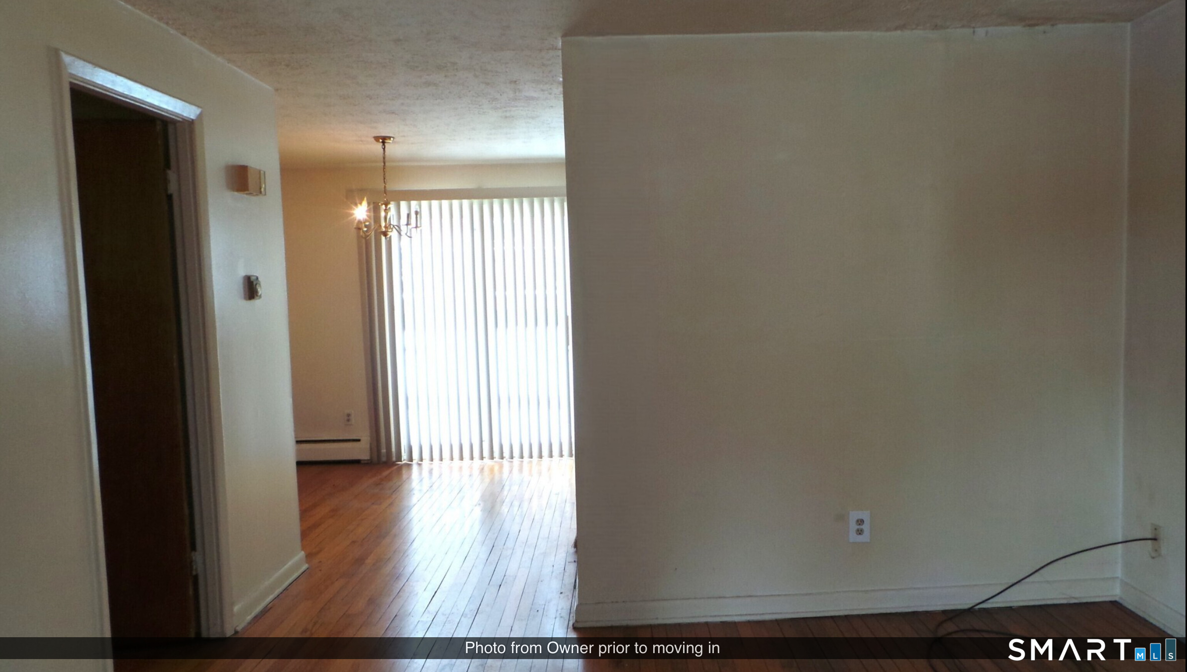 280 Capen Street Hartford, CT 06112 - Photo 10 of 11 a view of a hallway with wooden floor