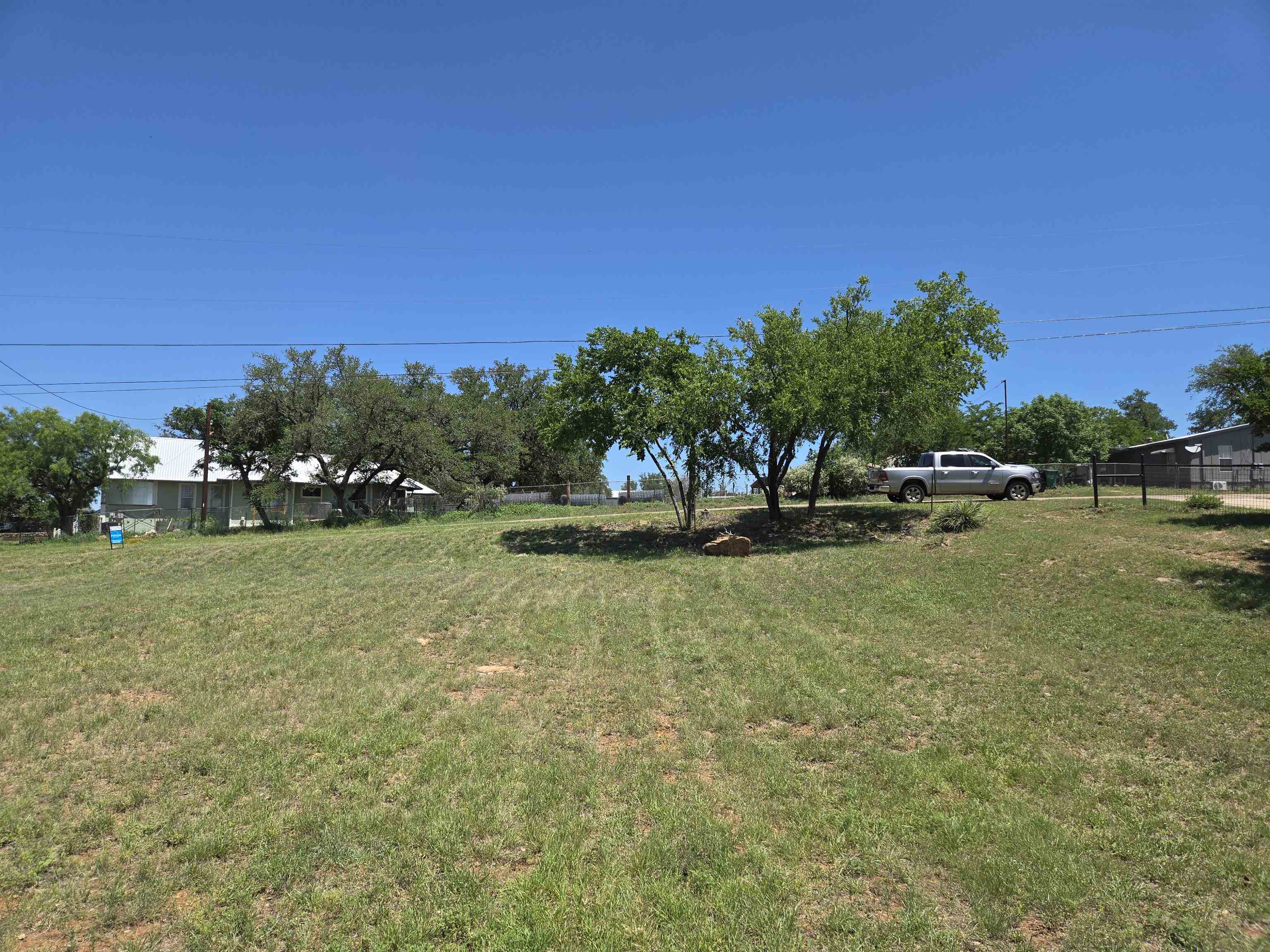East Tarrant Street Llano, TX 78643 - Photo 19 of 19 a view of a lake with outdoor space