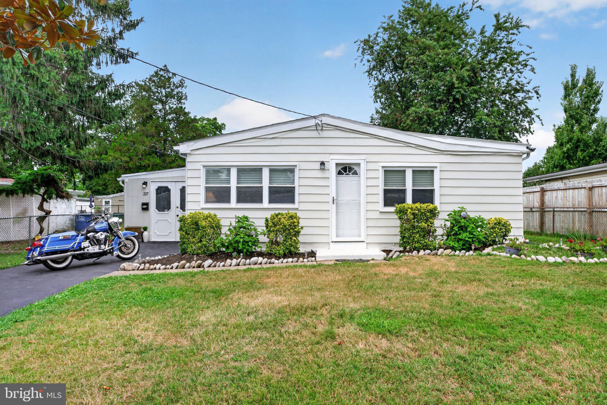 227 Ruth Avenue Maple Shade, NJ 08052 - Photo 1 of 22 Charming home with lush greenery.