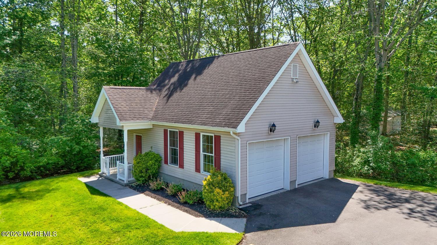 7 Cherry Tree Lane Cream Ridge, NJ 08514 - Photo 40 of 47 a house that has a tree in front of it
