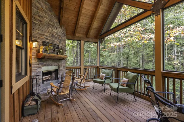 a view of a chairs and table on the balcony