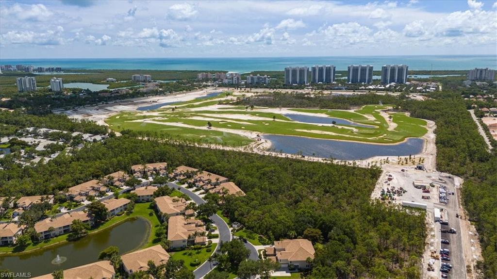 873 Carrick Bend Circle, Unit 101 Naples, FL 34110 - Photo 34 of 42 an aerial view of a house with a ocean view