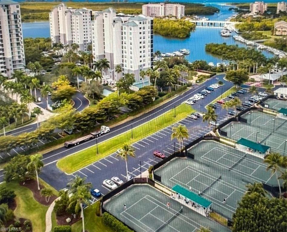 873 Carrick Bend Circle, Unit 101 Naples, FL 34110 - Photo 38 of 42 a view of a city