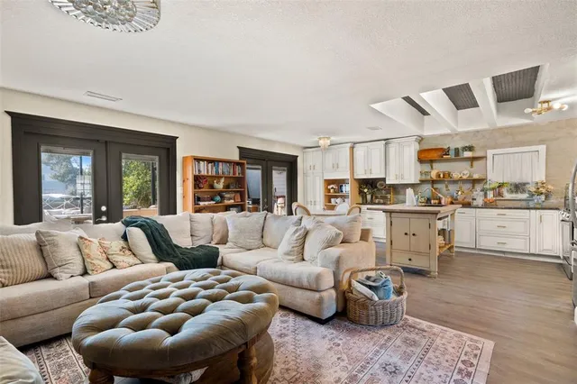 a bedroom with a bed and a table