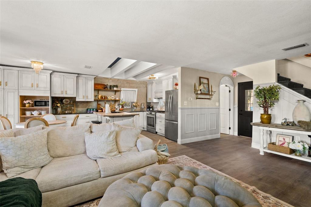 6271 Colony Circle Weeki Wachee, FL 34607 - Photo 16 of 60 a living room with furniture and kitchen view