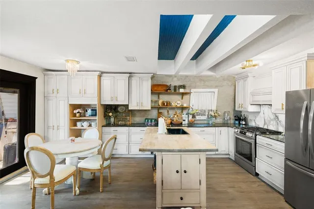 a bathroom with a sink toilet and a tub