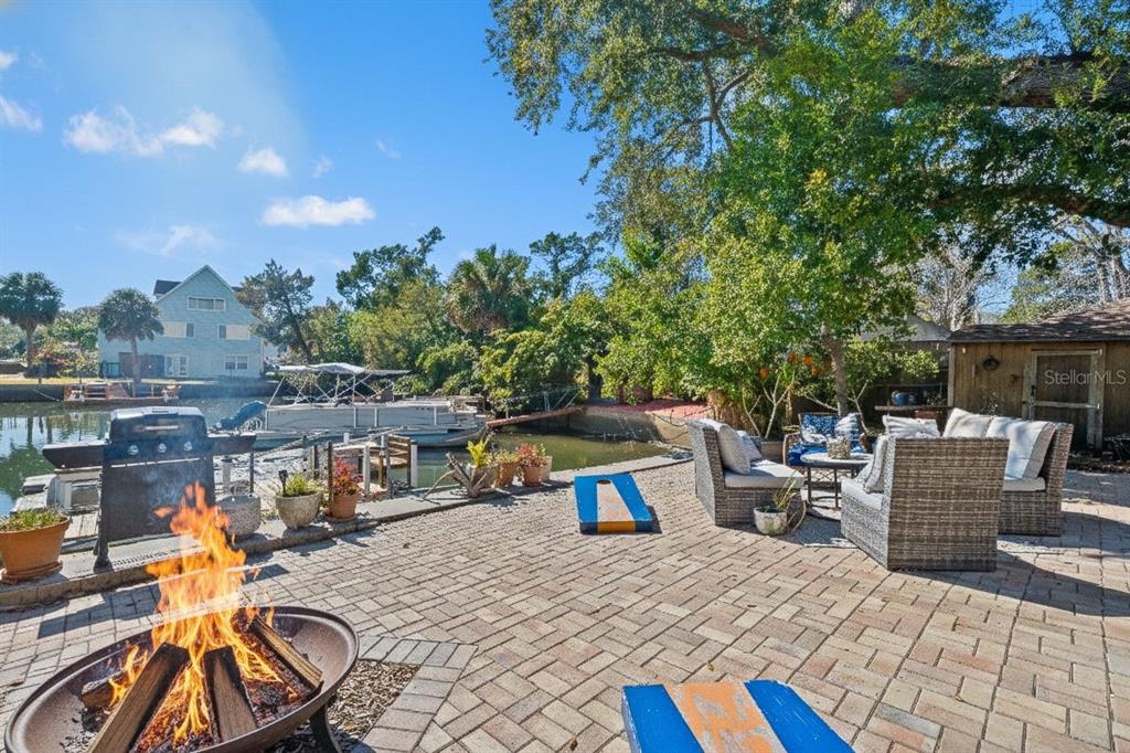 6271 Colony Circle Weeki Wachee, FL 34607 - Photo 47 of 60 a view of backyard with swimming pool and seating space