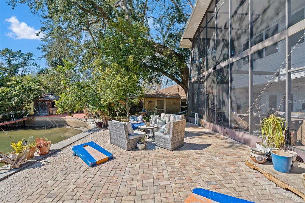 6271 Colony Circle Weeki Wachee, FL 34607 - Photo 48 of 60 a view of a backyard with sitting area