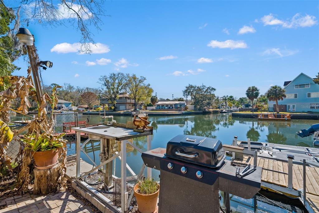 6271 Colony Circle Weeki Wachee, FL 34607 - Photo 53 of 60 a view of a lake with couches and city view